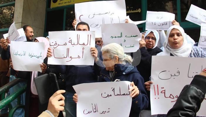 بالصور.. وقفة احتجاجية للعاملين بالتأمين الصحي بمستشفى 6 أكتوبر