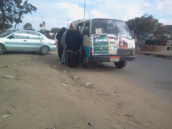 كفرالبطيخ..سيارات تحشد للتصويت بـ”نعم” باسم شفيق