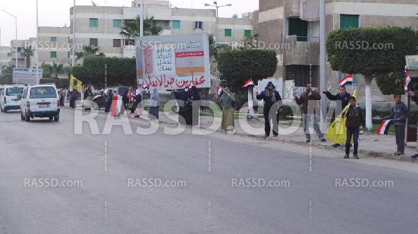 سلسلة بشرية ببرج العرب تنديدا بجرائم الانقلاب العسكري