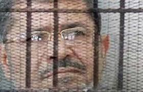 وصول مرسي لمقر المحاكمة فى قضية أحدات الاتحادية