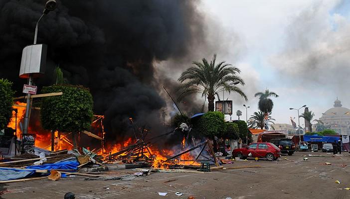 في رابعة وسوريا «الجثة المتفحمة» واحدة