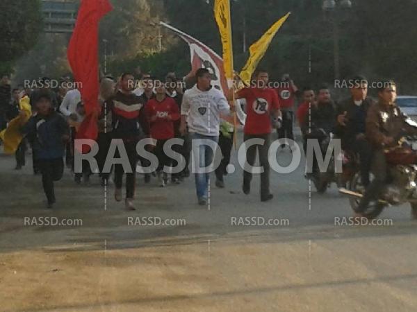 ماراثون بأعلام رابعة وسلاسل شبابية ببندر الفيوم