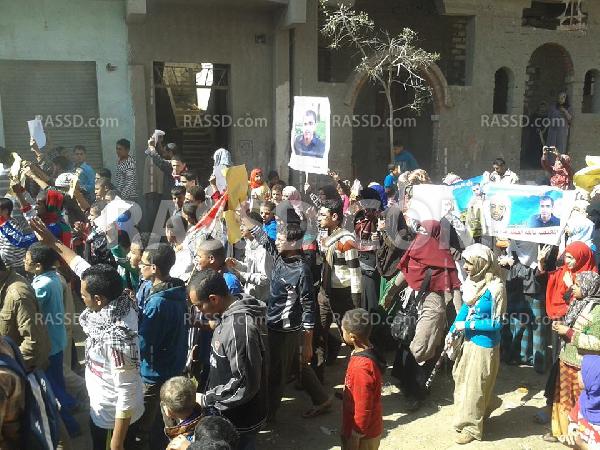 وقفة أمام منزل الشهيد “معتصم” ببني سويف