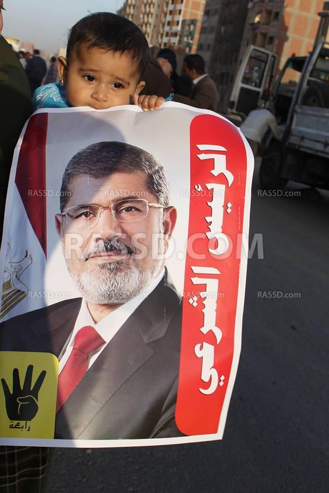 سلسلة بشرية مناهضة للانقلاب بفيصل “الجيزة”