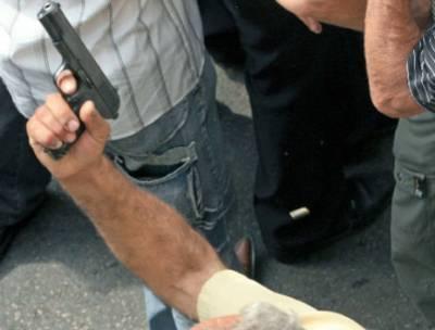 تبادل لإطلاق النار بين المتظاهرين وأصحاب المحلات بوسط البلد