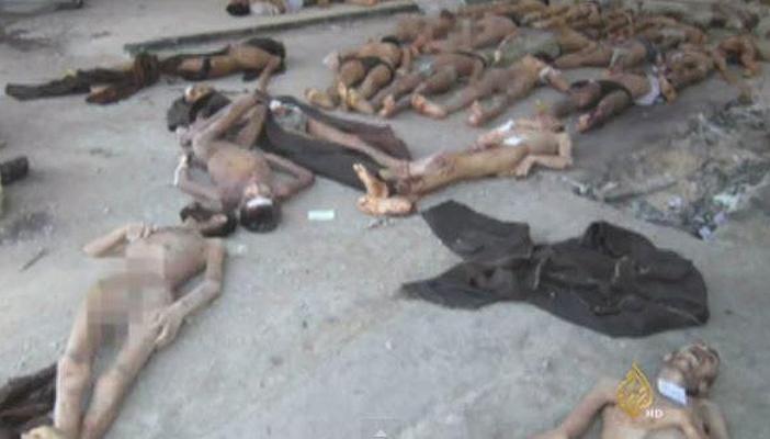 بالفيديو.. مئات الجثث في معسكرات تعذيب للنظام السوري