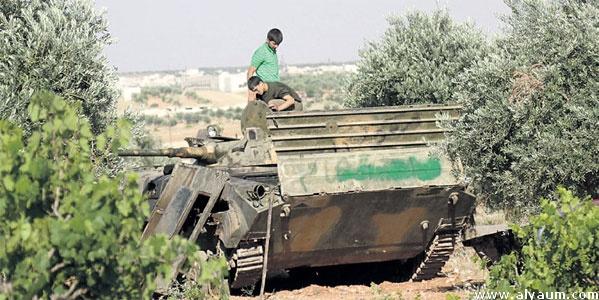 بالفيديو.. الأسد يستخدم المدنيين دروعا بشرية لمواجهة الثوار