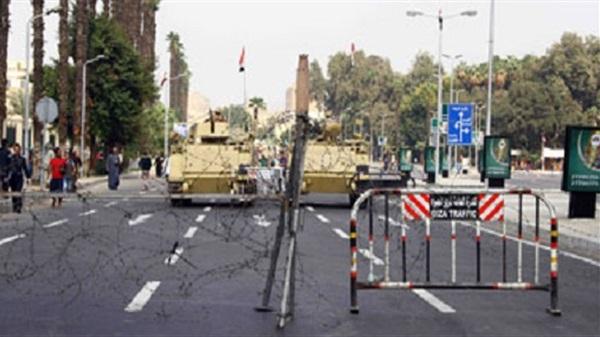 الأمن يغلق ميدان النهضة تحسبا لتظاهرات اليوم