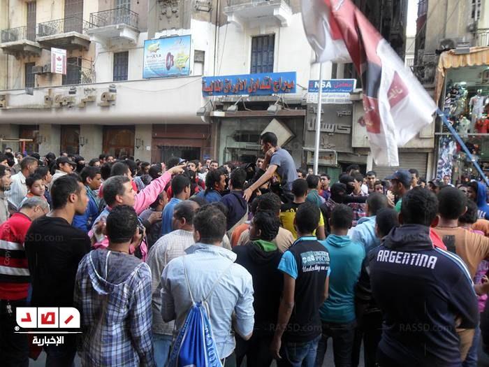 مسيرة دار القضاء تعود إلى التحرير بعد اشتباكات مع الباعة