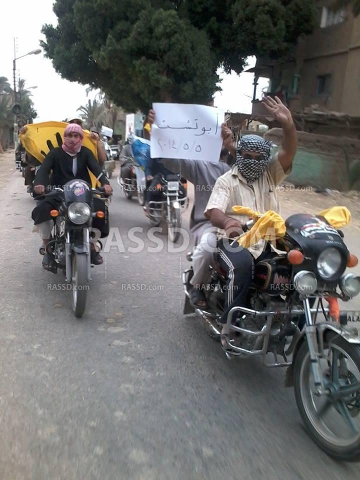 مسيرة بالدرجات النارية مناهضة للانقلاب بـ”قنا”