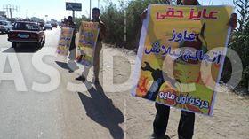 سلسلة بشرية لحركات عمالية للمطالبة بالحد الأدنى للأجور