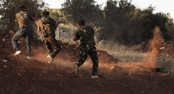 مجزرة لقوّات الأسد وحزب الله تطيح بـ26 شابا