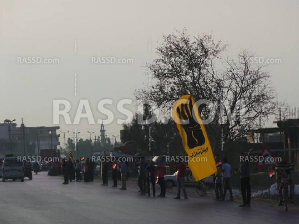 سلسلة بشرية بـ”البحيرة” رفضًا للانقلاب العسكري