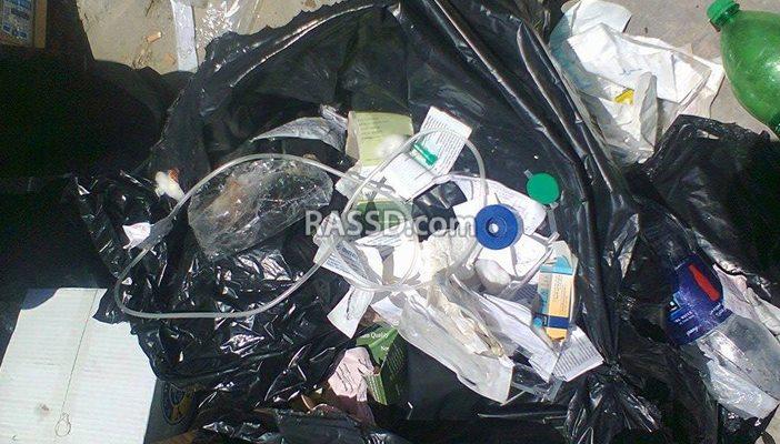 النفايات الطبية تملأ صناديق القمامة بمستشفى الزهور ببورسعيد