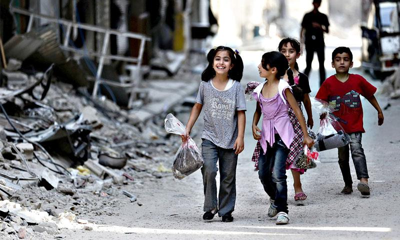 هكذا احتفل أطفال مدينة دوما السورية بالعيد