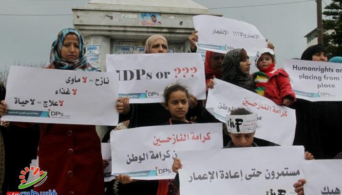 وقفة نسائية  للمطالبة بإعادة إعمار غزة في الذكرى الأولى للحرب