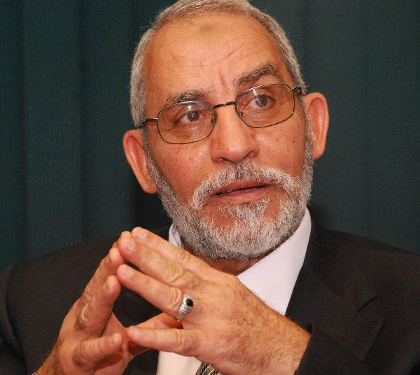 فلسطيني ينوي مقاضاة وسائل إعلام مصرية ادعت مرافقته “بديع” برابعة