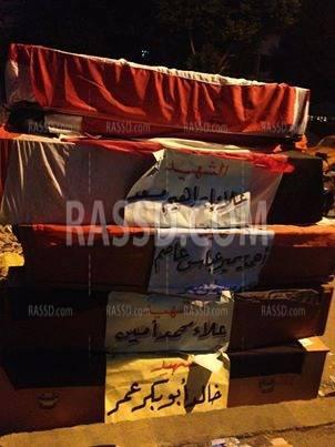 نعوش رمزية لشهداء “مجزرة الفجر” بميدان رابعة