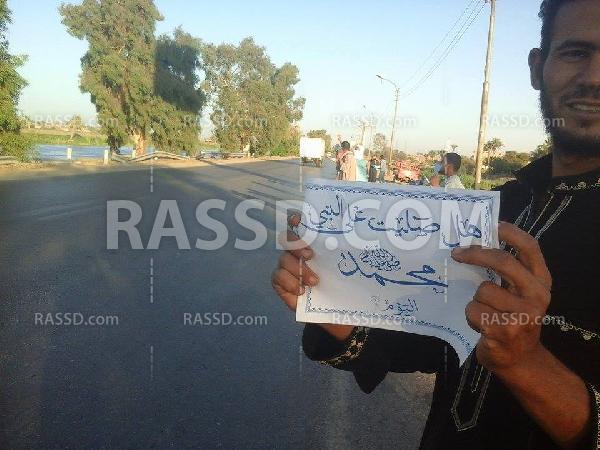 سلسلة بشرية في “أسيوط” تنديداً بالانقلاب العسكري