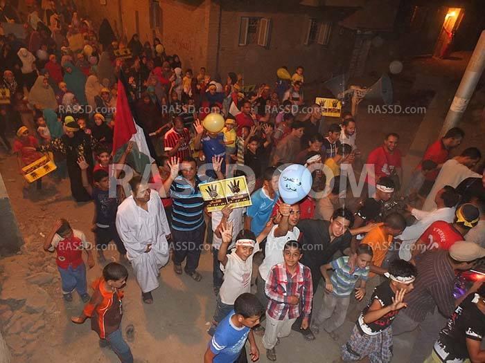 مسيرة ليلية في قرية “الأعلام” بالفيوم