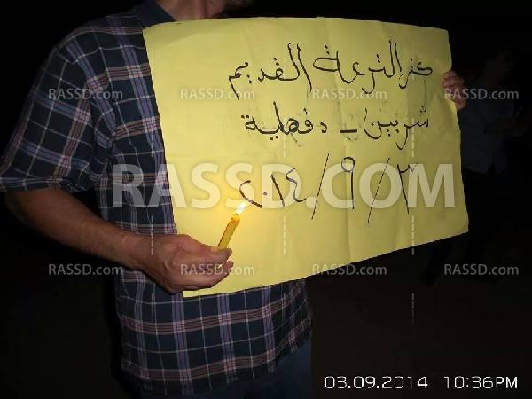 وقفة بالشموع لأهالي قرية “كفر الترعة” بالدقهلية