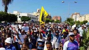 اعتقال ركاب سيارة لرفعهم شعار رابعة بينهم طفلة 6 سنوات