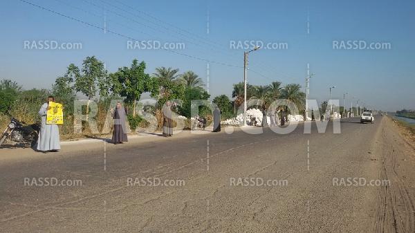 سلسلة بشرية في “الأقصر” تنديدًا بالوضع الاقتصادي