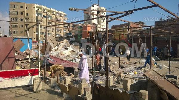 صور | حملة لإزالة الإشغالات بـ”الأربعين”بالسويس وسط استياء الباعة