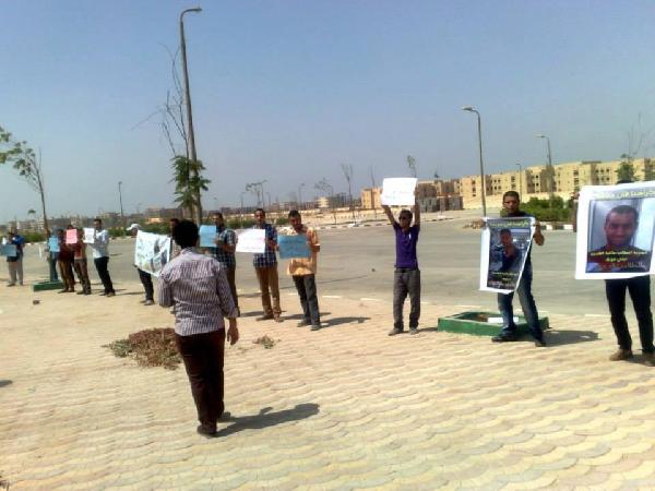 سلسلة بشرية ببني سويف رفضا للانقلاب