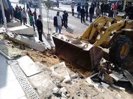 الباعة الجائلون بالعمرانية يعترضون على حملات الإزالة