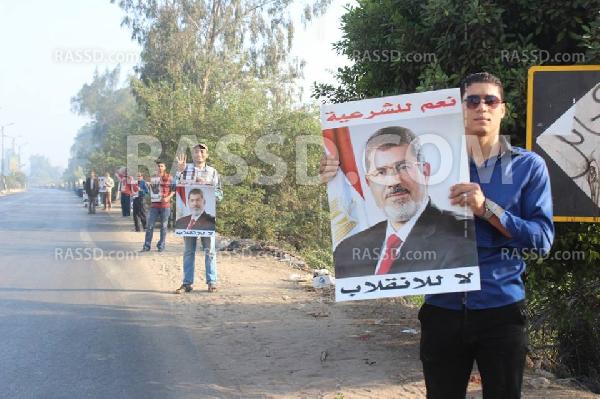 سلسلة بشرية لرافضي الانقلاب بميت غمر