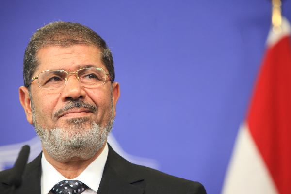 الدماطي: الرئيس مرسي هو من سيحدد خط سير محاكمته