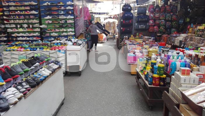 بالصور.. الأسواق التجارية في بورسعيد بلا زبائن