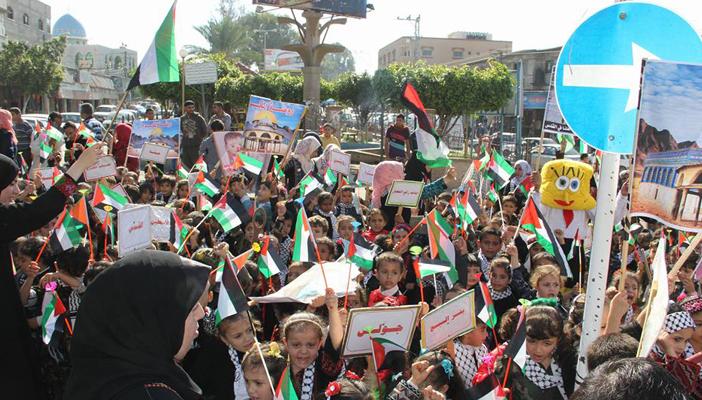 مسيرة أطفال في غزة إحياءً ليوم الطفل العالمي