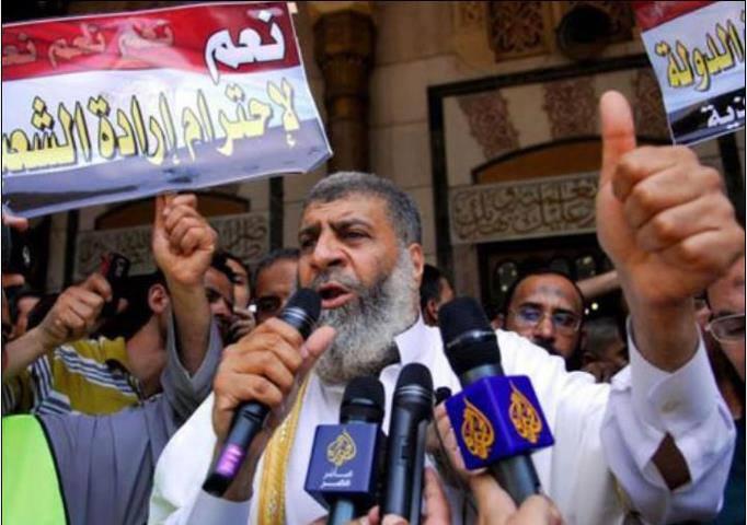 الانقلاب يطالب الانتربول بالقبض علي “عبد الماجد”