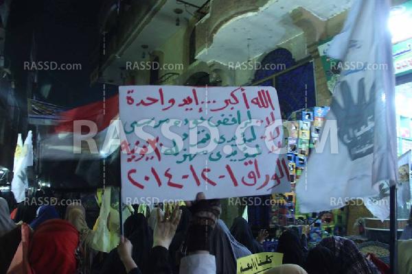 “الوراق” تتظاهر للتنديد بجرائم العسكر