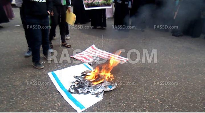 حرق علم “إسرائيل وأمريكا” بمسيرة صباحية في بورسعيد