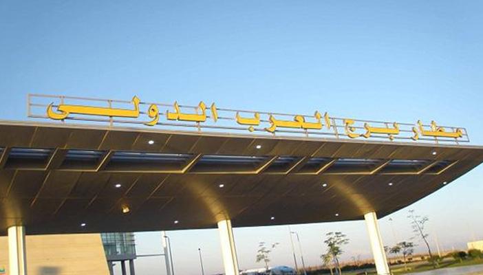 ضبط محاولة تهريب أموال داخل كيكة بمطار برج العرب