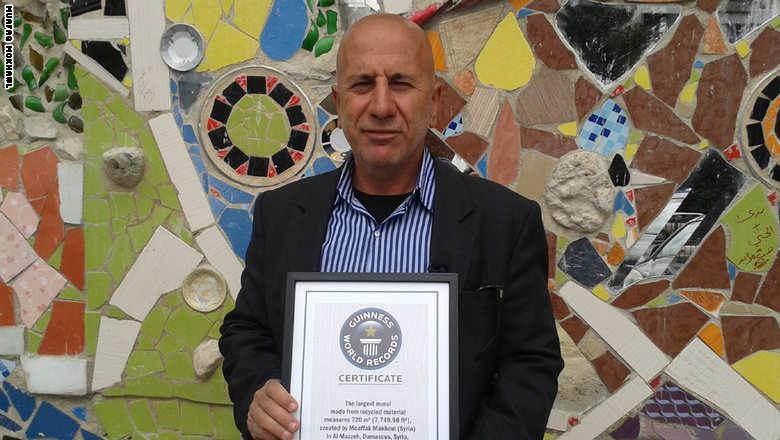 فنان سوري يدخل موسوعة جينيس بأضخم جدارية على مستوى العالم